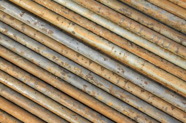 oxidation rusty metal pipe, closeup of photo