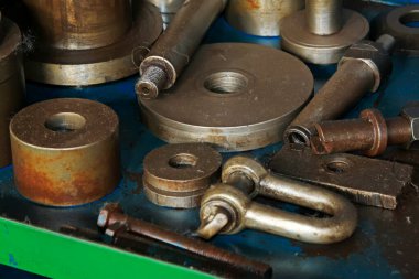 metal parts piled up together, closeup of photo