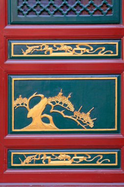 kırmızı ahşap kafes, fotoğrafın yakın çekimi