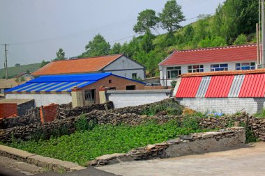 WEICHANG COUNTY - 20 Temmuz 2014 'te Huashulin Köyü' nde ikamet eden manzara mimarisi, Weichang County, Hebei Eyaleti, Çin.