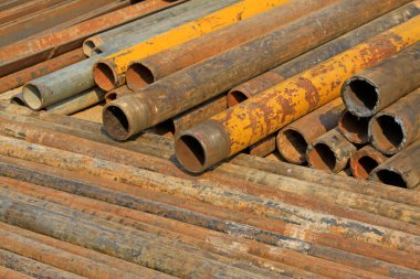 oxidation rusty metal pipe, closeup of photo