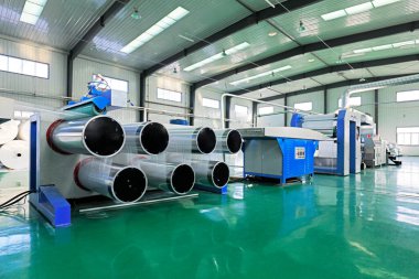 Plastik dokuma atölyesi Çin üretim hattı çiziyor.