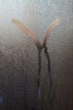 water drops and trace on the window, closeup of photo