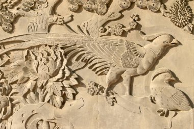 Anka kuşu heykeli tahtada