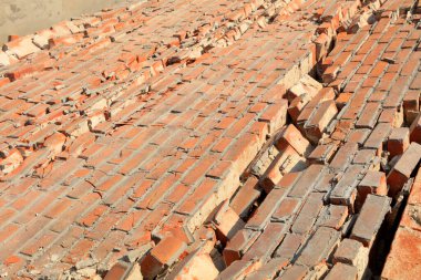 Collapsed walls, closeup of photo