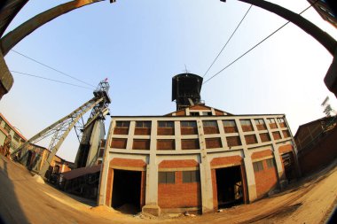 TANGSHAN - 2 Ocak 2014 'te, Çin' in Hebei eyaletinin Tangshan şehrinde, Kailuan Ulusal Maden Parkı 'nda, maden ocağı mimari görünüşü. 