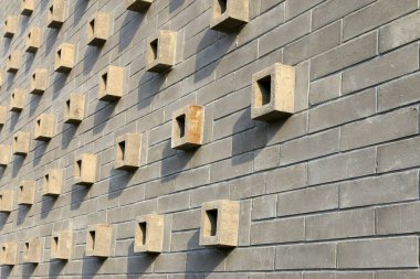 Gri duvar süslemesi, fotoğrafın yakın çekimi.