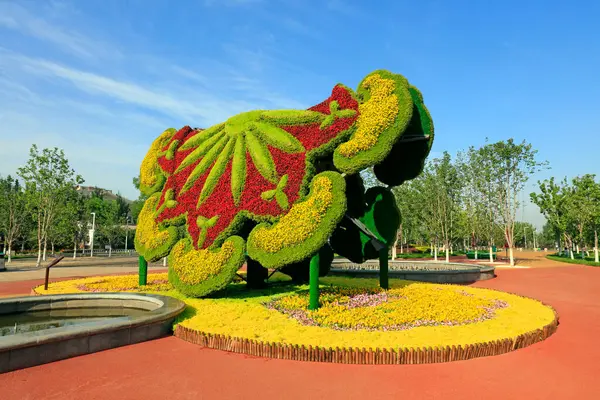 Bitki yeşili heykel, Chin