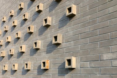 Gri duvar süslemesi, fotoğrafın yakın çekimi.