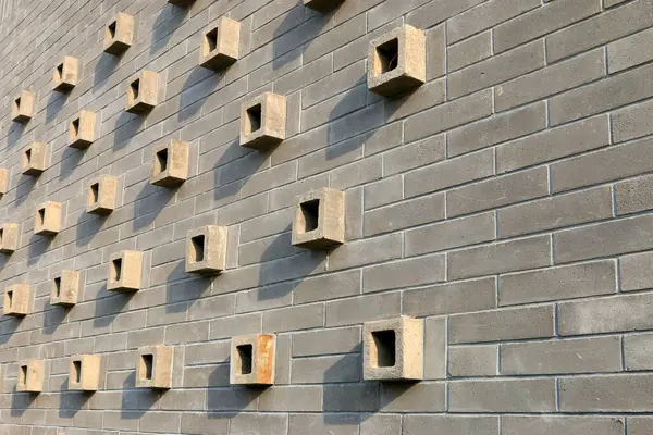 Gri duvar süslemesi, fotoğrafın yakın çekimi.