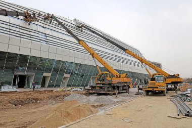 Tangshan Tangshan - 6 Mart 2016 'da Tangshan Uluslararası Konferansı ve Sergi Merkezi şantiyesi, Tangshan, Çin