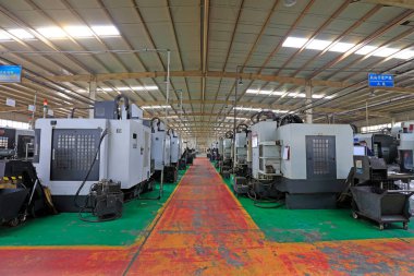 Tangshan City - 20 Ekim 2016: Tangshan City, Hebei, Chin 'deki fabrikada çalışan işçiler