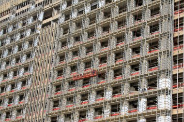 Unfinished buildings, closeup of photo