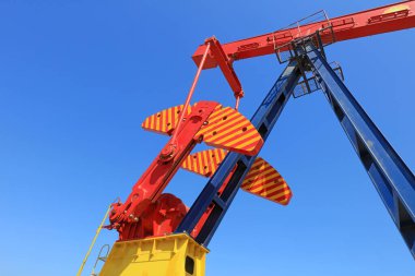 Işın kolu dengeli pompalama ünitesi