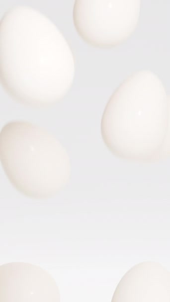 Λευκά Πασχαλινά Αυγά Πέφτουν Κάτω Και Γεμίζουν Την Οθόνη Καθιστούν — Αρχείο Βίντεο