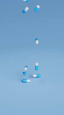 Mavi arka plana yavaş çekimde beyaz ve mavi haplar düşüyor. İlaçlar, haplar, haplar, ilaç konsepti. 3D canlandırma canlandırması. Dikey video.