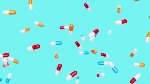 Blue Red Capsules Slowly Fall Blue Backdrop Drugs Pills Tablets — Stockvideo