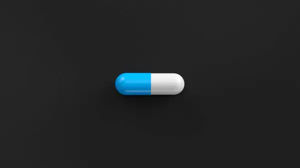 Comprimido Único Azul Branco Isolado Fundo Preto Comprimido Cápsula Pílula — Fotografia de Stock