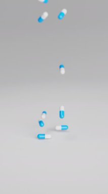 Beyaz ve mavi haplar yavaş çekimde arka plana düşüyorlar. İlaçlar, haplar, haplar, ilaç konsepti. 3D canlandırma canlandırması. Dikey video.