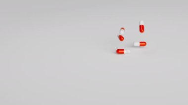 Beyaz ve kırmızı haplar yavaş çekimde arka plana düşüyorlar. İlaçlar, haplar, haplar, ilaç konsepti. 3d canlandırma canlandırması.