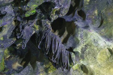 Geological structures and formations of limestone in cave of skulls, Cueva de las Calaveras in Benidoleig, Valencia clipart