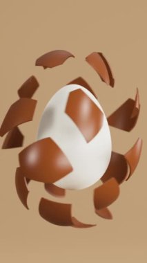 Çikolatalı yumurta kabuğu soyuluyor ve beyaz yumurta ortaya çıkıyor. Paskalya yumurtası animasyonu. 3 boyutlu görüntüleme. Dikey video.