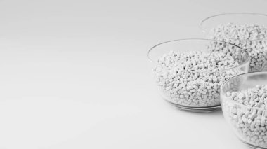 Glass cups with white plastic polypropylene granules, masterbatch polymer grain, on white backdrop. HDPE or PVC resin pellets. 3d render illustration. clipart