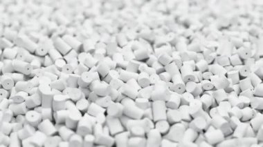Beyaz plastik polipropilen granüller, başyapıt polimer tahıllar arasında uçmak. HDPE veya PVC reçine topakları. 3d canlandırma canlandırması.