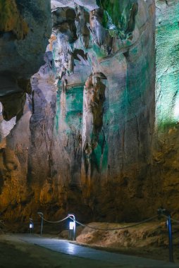 Interior with parthway of cave of skulls, Cueva de las Calaveras in Benidoleig, Valencia. clipart