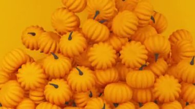 Birçok turuncu balkabağı düşer ve ekranı doldurur. Cadılar Bayramı balkabağı animasyonu. 3d hazırlayıcı.
