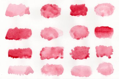 Beyaz zemin üzerine kırmızı suluboya soyut. Kağıt üzerinde sıçramasına renk. Bir elle çizilmiş olduğunu.