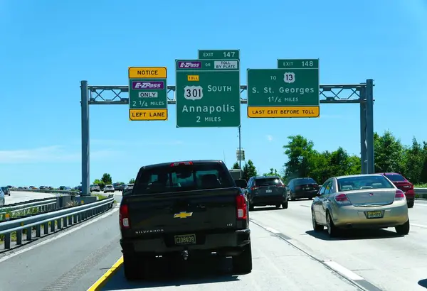 stock image Middletown, Delaware, U.S - June 8, 2024 - The traffic on Route 1 South with the road sign towards Rt 301 South and Rt 13 South