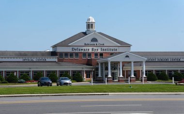 Rehoboth Beach, Delaware, U.S - July 5, 2024 - The front view of the Delaware Eye Institute building clipart