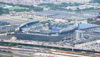 Philadelphia, Pennsylvania, U.S.A - July 15, 2024 - The aerial view of Lincoln Financial Field, the main football stadium in the city next to Interstate 95 clipart