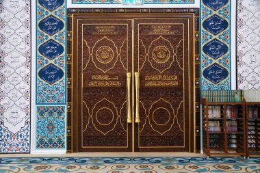 Pangkor Island, Perak, Malaysia - January 20, 2025 - Beautifully crafted large door of the Al-Badr Mosque clipart