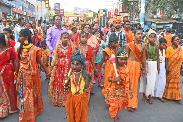 Stock image Burdwan Town, Purba Bardhaman District, West Bengal / India - April 17, 2024: Devotees take out a procession with weapons on Rama Navami in Burdwan.