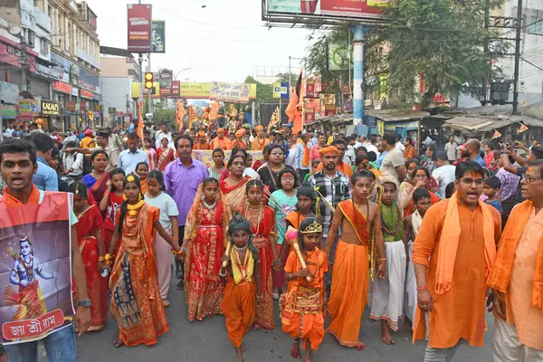 stock image Burdwan Town, Purba Bardhaman District, West Bengal / India - April 17, 2024: Devotees take out a procession with weapons on Rama Navami in Burdwan.