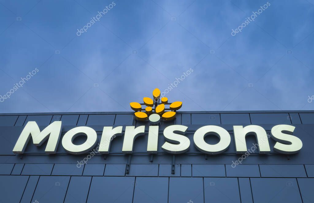 Morrison's Supermarket Sign Against a Partly Cloudy Sky