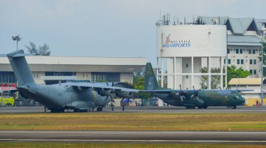 Langkawi, Malaysia - Mar 30, 2019. Military aircrafts dock at Langkawi Airport. Langkawi Island is home to a major air show every two years.