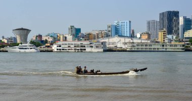 Saigon, Vietnam - Feb 11, 2023. Scenery of Saigon (Ho Chi Minh city) seen from the river bank. Saigon is the largest financial and economic center in Vietnam.