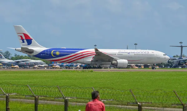 stock image Langkawi, Malaysia - May 28, 2023. 9M-MTI Malaysia Airlines Airbus A330-300 taxiing for takeoff from Langkawi Airport (LGK), Malaysia.