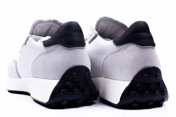 Sneakers Wit Maaien Een Witte Achtergrond Sportschoenen — Stockfoto