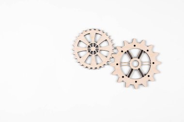 Gears. Gear wheel. Mechanisms are interconnected by themselves. On a white background. The concept of dependence on each other.