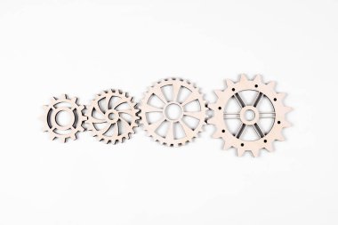 Gears. Gear wheel. Mechanisms are interconnected by themselves. On a white background. The concept of dependence on each other.