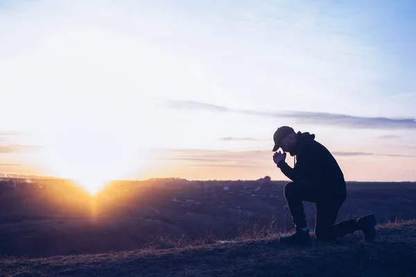 stock image Prayer. A man prays on his knees. Repentance for sins. Kneeling