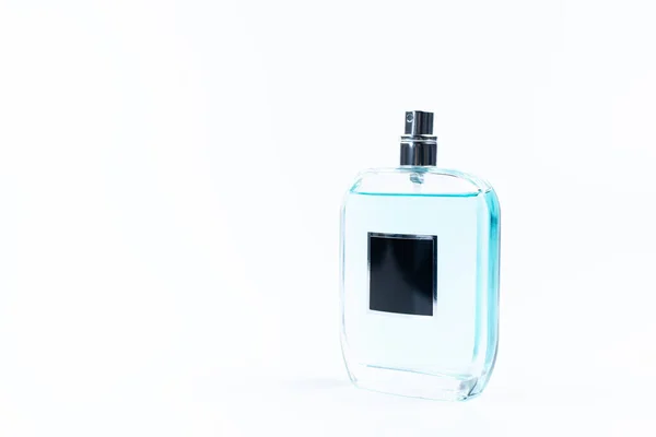 stock image Glass bottle with perfume. On a white background.