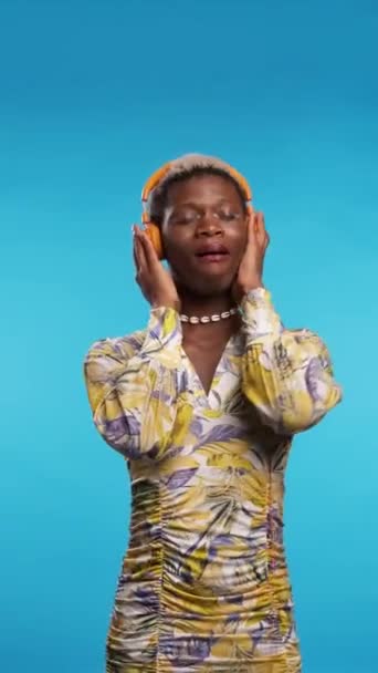 Black Man Stylish Dress Touching Headphones Dancing While Listening Music — Stock Video