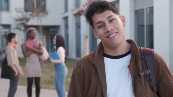 Slow Motion Video Smiling Latin Young Man Piercings Looking Camera — Vídeos de Stock