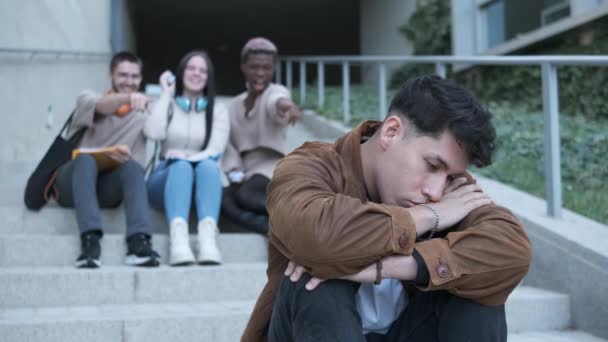 Slow Motion Video Multiethnic Group Students Pointing Bulling Hispanic Man — Stockvideo