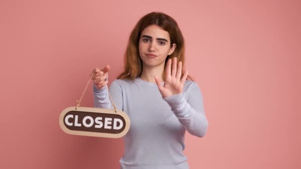 Studio Video Pink Background Woman Indicating Area Closed Putting Sign — Stock Video